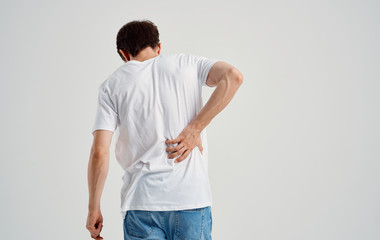 the man's back hurts