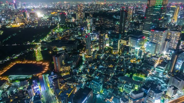 Timelapse of Towering Skyline City Lights in Tokyo -Zoom Out-
