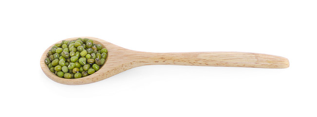 mung beans in wood spoon isolated on white background