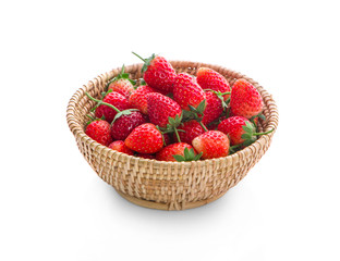 Strawberries in basket isolated on a white background