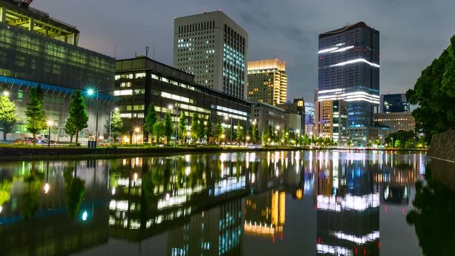 Timelapse of Reflected City Lights in Downtown Tokyo -Pan Right-