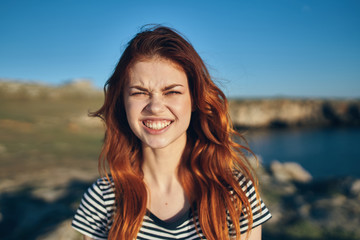 woman with emotions on nature face