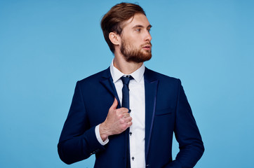 business man in a suit on a blue background