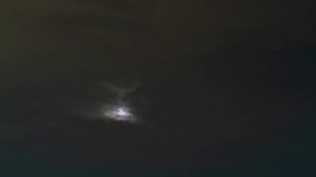 Timelapse of Moon Rising through Clouds 