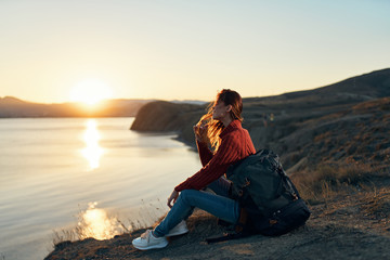 woman watching sunset at sea