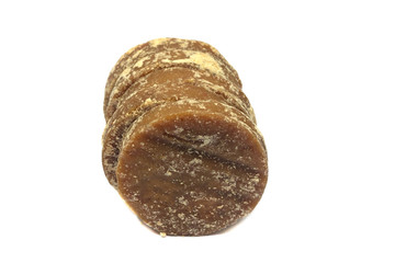 Brown sugar and palm sugar isolate on black background
