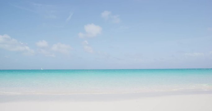 Beach vacation travel paradise background. Perfect white sand beach with turquoise water ocean and clear blue sky. RED EPIC SLOW MOTION.