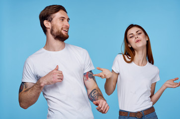 young couple on a blue background