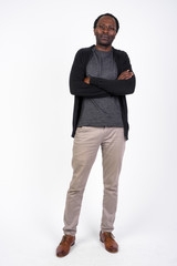 Fototapeta premium Full body shot of handsome African man with arms crossed