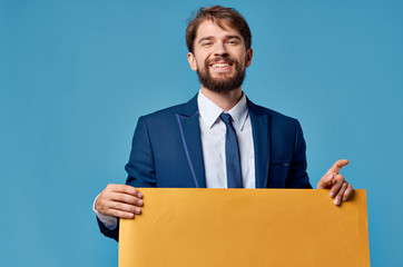 man smiling holding banner place free