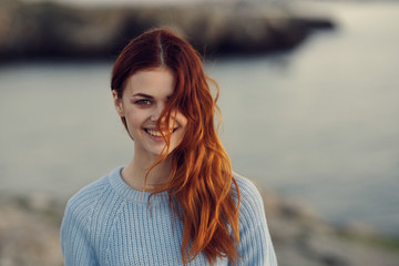 redhead woman smiling nature