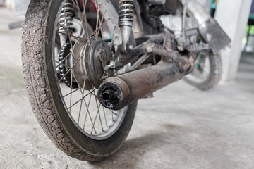 Obraz premium motorcycle tires and exhaust