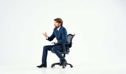 business man sitting in a chair on an isolated background