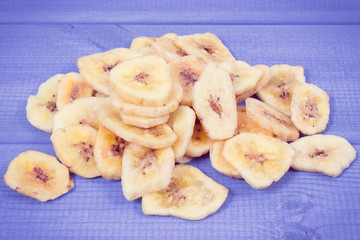 Homemade dried chips of banana for snack or dessert