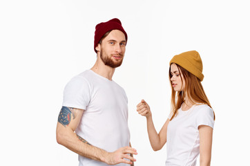 young couple in white t-shirts