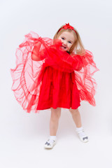 Concept portrait of a cute little girl in fashionable clothes. beautiful child