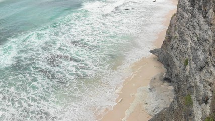 Fototapeta na wymiar 4K Aerial view of dreamland beach, Bali island.