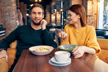 friends in a cafe have lunch