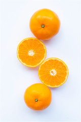 Fresh orange citrus fruit on white.