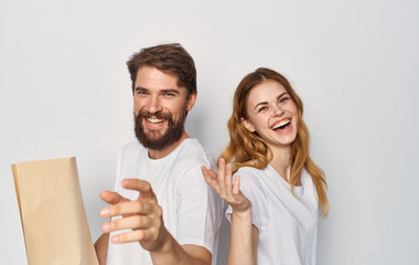 happy young couple on white background portrait