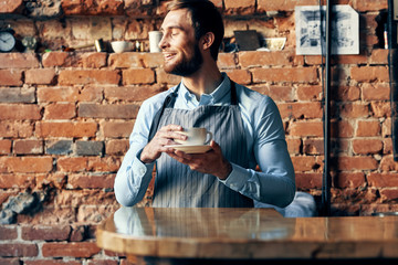 bartender pours coffee in a cafe