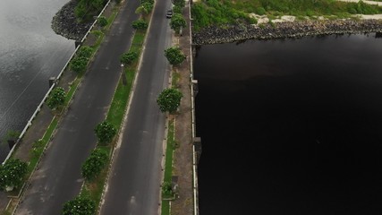 Young couple on the bridge. Serangan, tropical island of Bali, Indonesia.