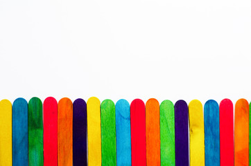 colored background of wooden sticks for ice cream