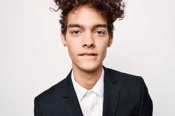 african man bit his lip portrait