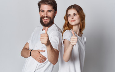 Fototapeta premium young couple show thumbs up
