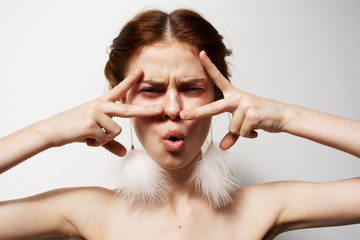 Fototapeta premium woman with earrings emotions face portrait