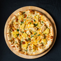 pizza on the black background