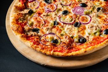 pizza on the black background