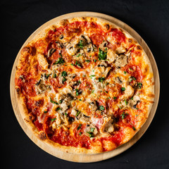 pizza on the black background