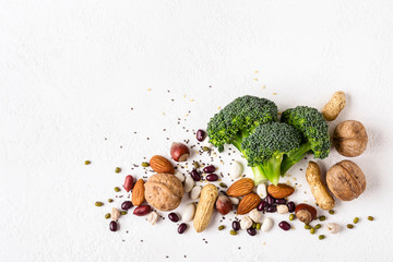 Broccoli, beans and nuts sources of vegetable protein. Vegan healthy food concept