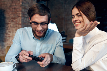 business colleagues in a cafe chat