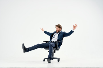 business man riding his chair on an isolated background