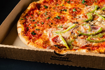 pizza on the black background