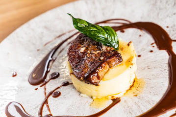 Mashed potato with meat and sauce