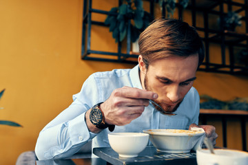 business man having lunch at a cafe