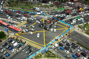 Aerial view looking down onto very busy intersection with heavy traffic
