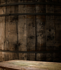 background of barrel and worn old table of wood