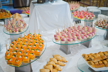 Glass shots pastry, wedding catering food, mini canapes food, tasty dessert, Beautiful decorate catering banquet table,  snacks and appetizers, wedding celebration