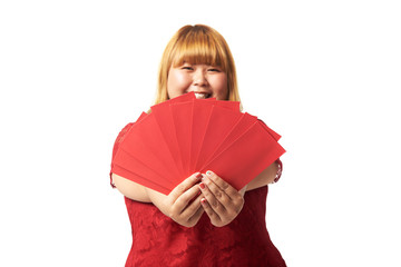 Asian woman holding ang pow or red packet monetary gift. Chinese new year concept.