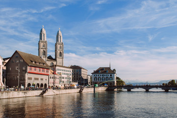 Obraz premium Old Grossmunster cathedral and medieval buildings in Zurich Old town Altstadt