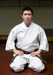 male martial arts coach in a gym