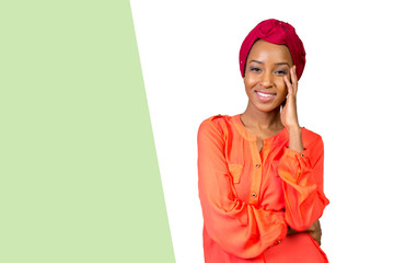 Young Afro beauty wearing a red headscarf