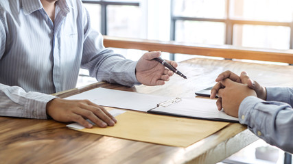 Agent broker and client signing contract agreement approved to buy