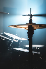 Close-up Drum set in a dark room against the backdrop of the spotlight. Atmospheric background...