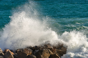 Sea waves break on the rocks - Liguria Italy