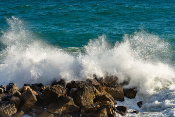 Sea waves break on the rocks - Liguria Italy